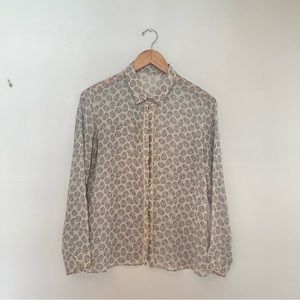 Skeleton pattered see through button up with gold buttons. 🖤